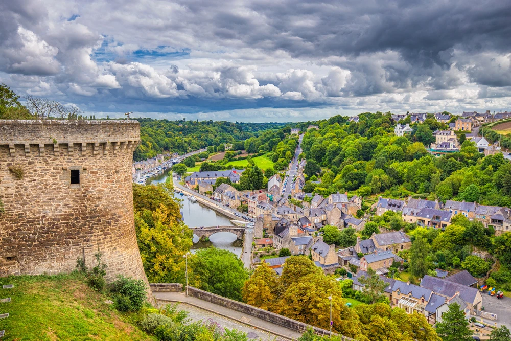 **The town of Dinan, a medieval Breton city famous for its ramparts, old houses, and historic center.** Photo selected by monsieurdefrance.com: pandionhiatus3 via depositphotos
